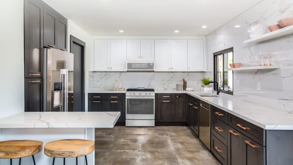 Spacious kitchen style with brown and white cabinets