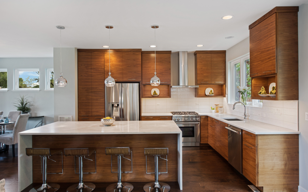 Contemporary kitchen with wood cabinets and white countertop